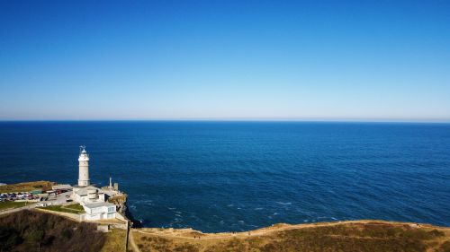Free A stunning seascape view of Cabo Mayor Lighthouse and the vast ocean in Santander, Spain. Stock Photo