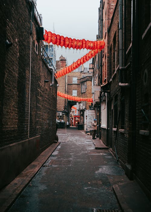 Chinese Lanterns Above a Narrow Street in London