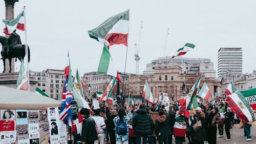 Iran Flags Flying During a Protest in London