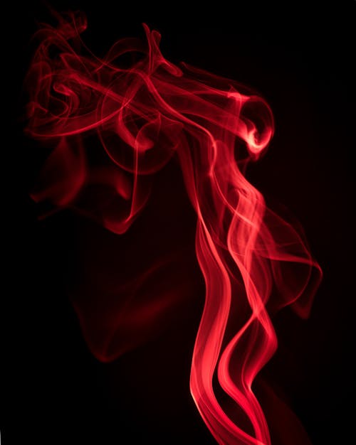 Red Fumes in Black Background