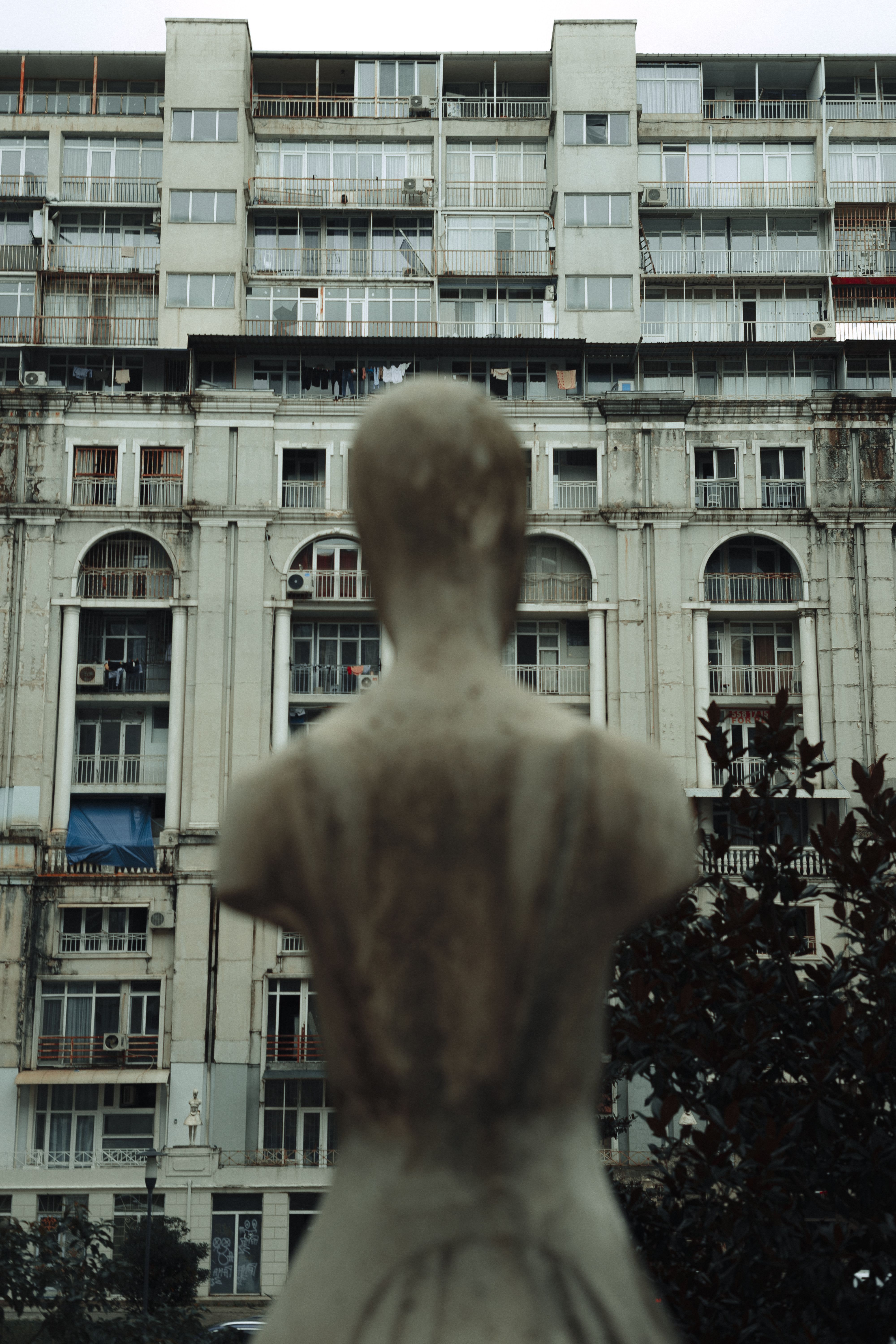 Sculpture in front of a Building · Free Stock Photo