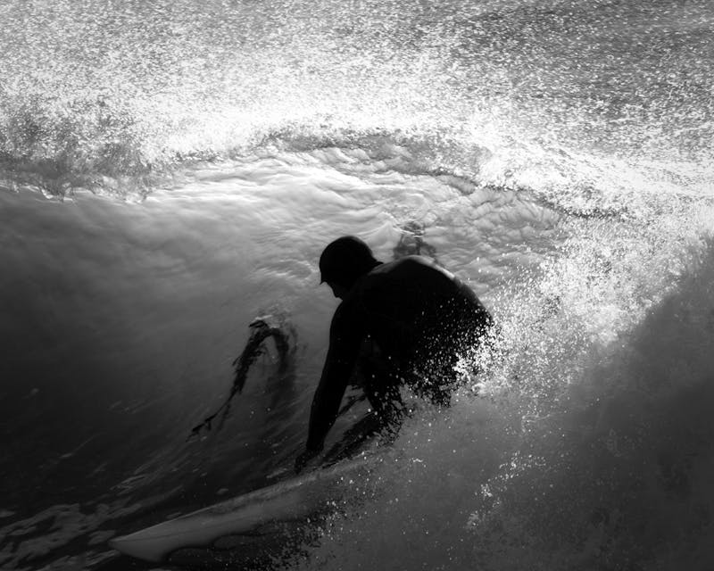 Person doing metabolic conditioning workout with pull-ups and intense exercise