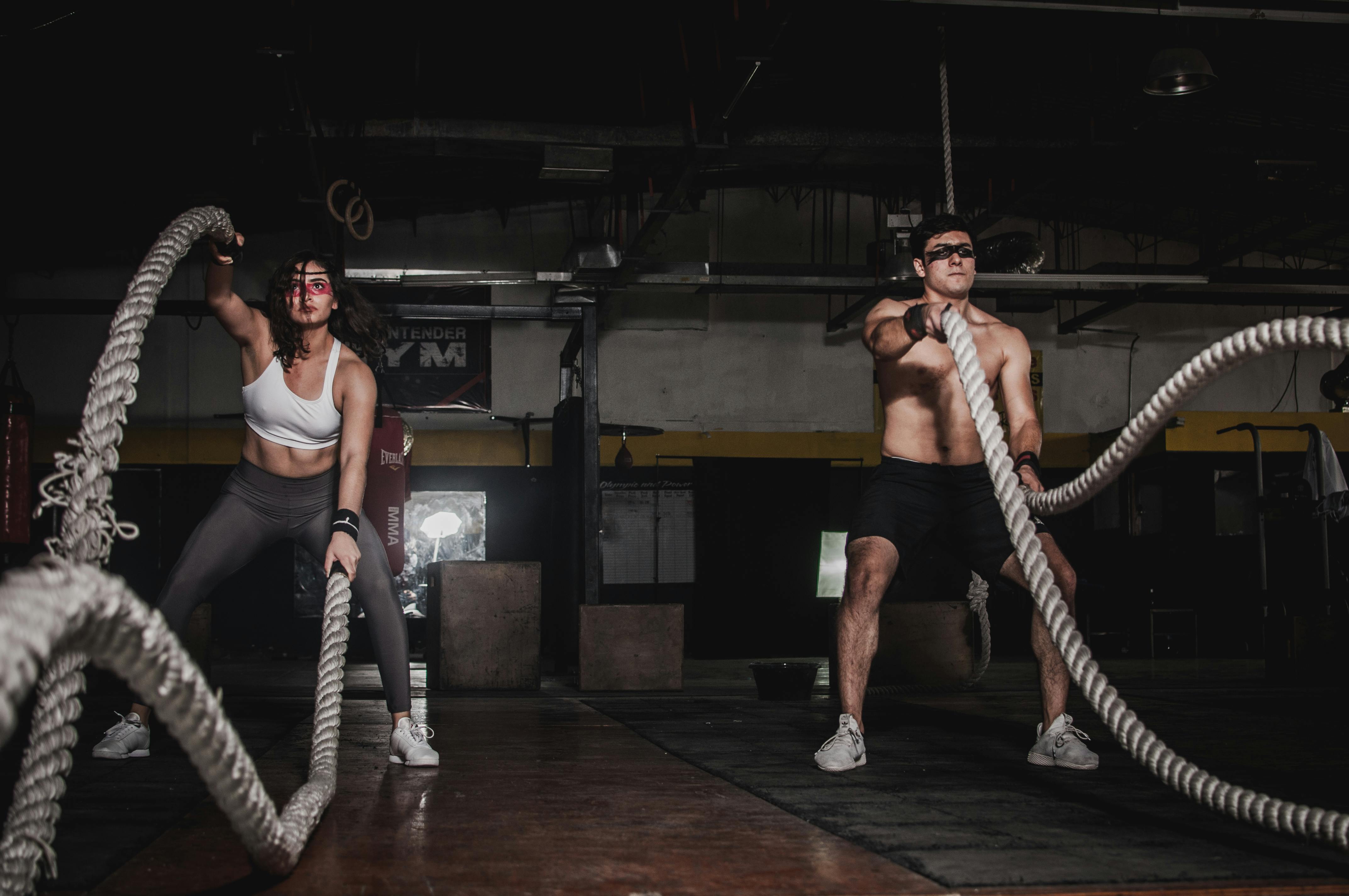 Woman holding jumping rope hi-res stock photography and images