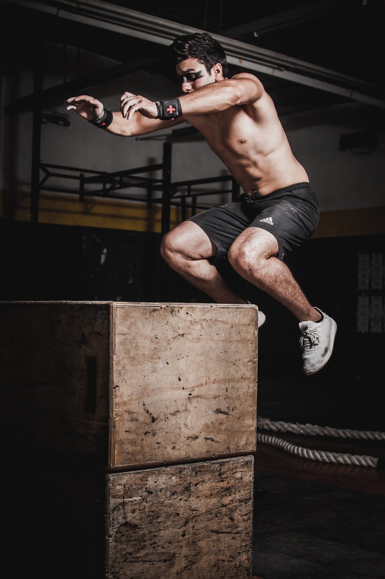 Photo Of Man Jumping On Box