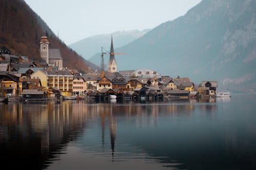 Hallstatt Town over Lake in Alps Mountains