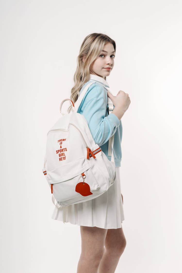 Blonde Woman With Backpack