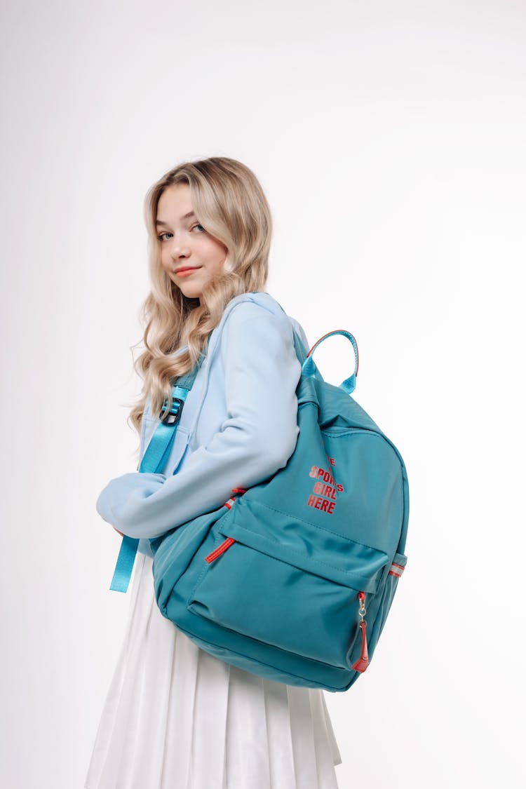 Blonde Woman Posing With Backpack