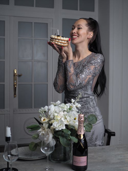 Woman in an Elegant Dress Celebrating Her Birthday 