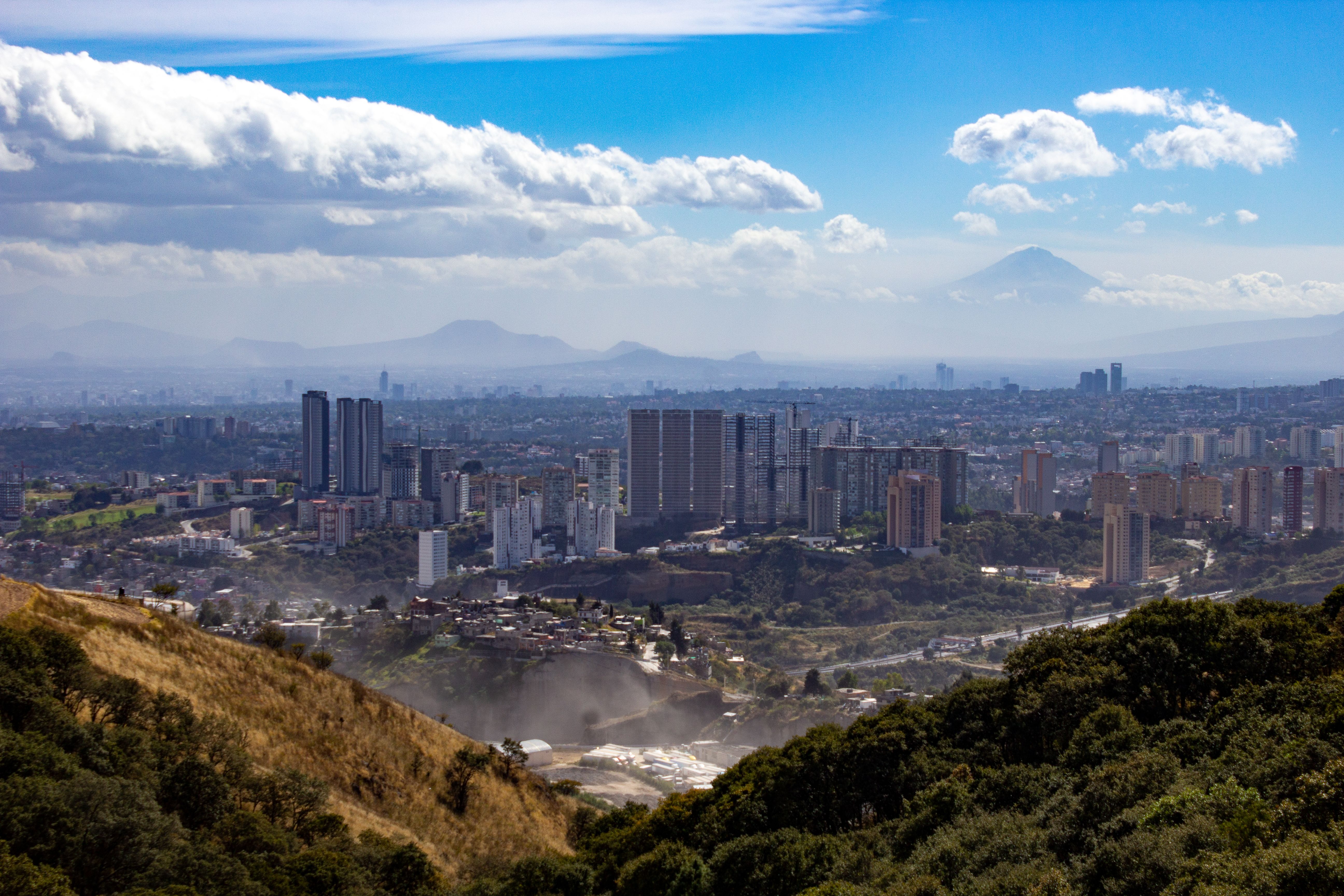 Panoramic View of a City in a Mountain Valley · Free Stock Photo