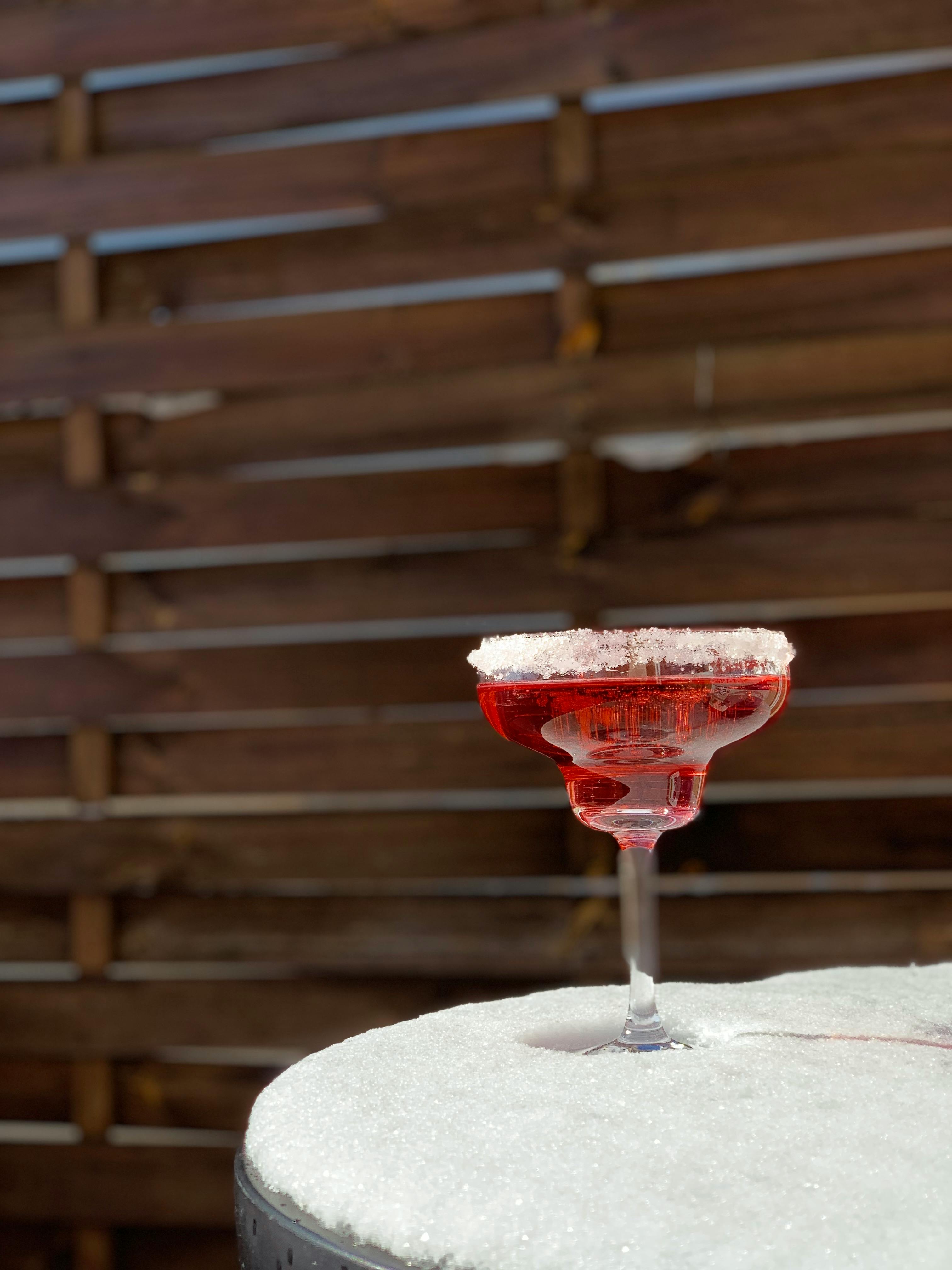 Red Margarita with Sugar Crusta Standing on Snowed Table · Free Stock Photo