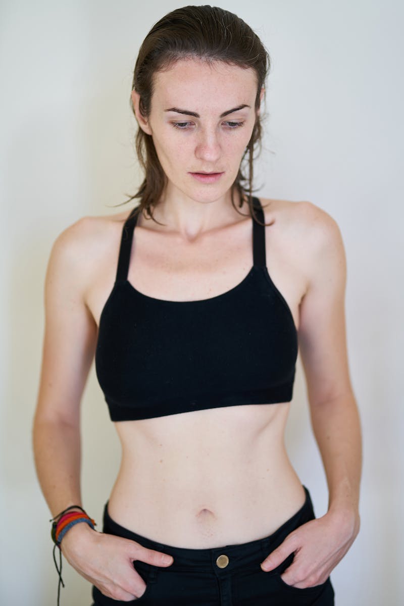 Photo of Woman in Black Crop Top