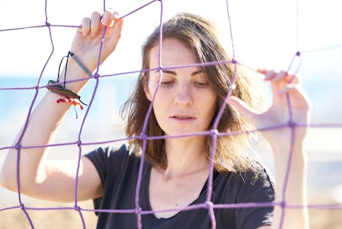 Photo Of Woman Holding Net