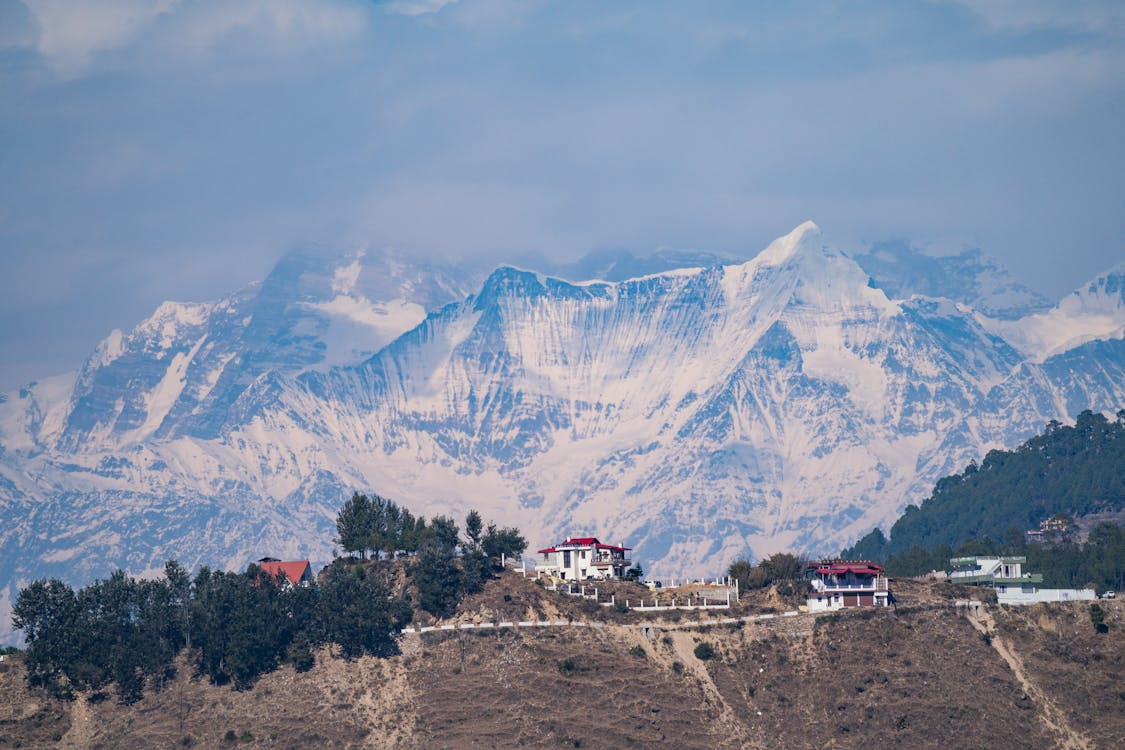Бесплатное стоковое фото с вершины, горы, дома
