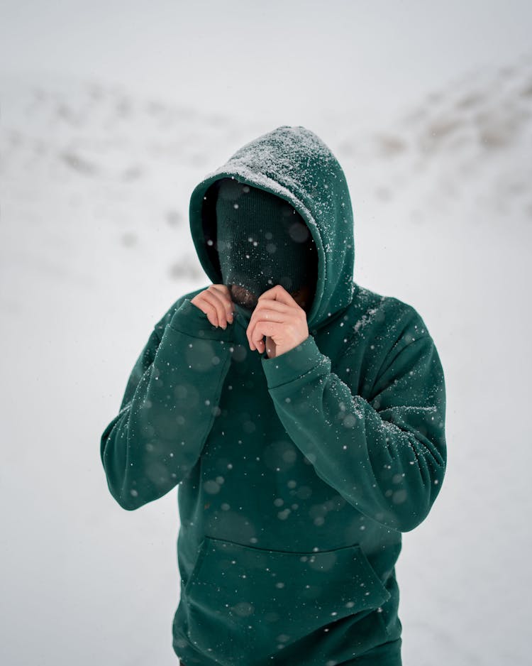 Man In Mask Walking In Snow