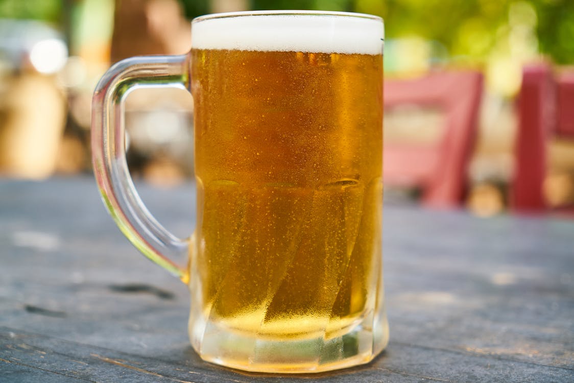 Free Beer Filled Mug on Table Stock Photo