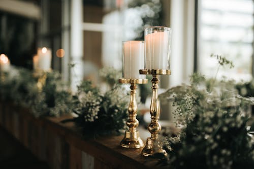 Candles on Gold Holders on Restaurant Decor