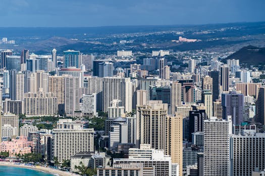 Photo by Cyrill Stunning aerial view of Honolulu showcasing its vibrant skyline and urban landscape.