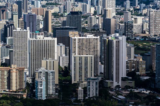 Explore the dynamic cityscape of Honolulu with towering skyscrapers and urban architecture.