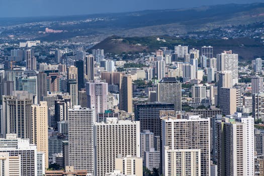 Capture of Honolulu's urban skyline, highlighting modern skyscrapers and vibrant city life.