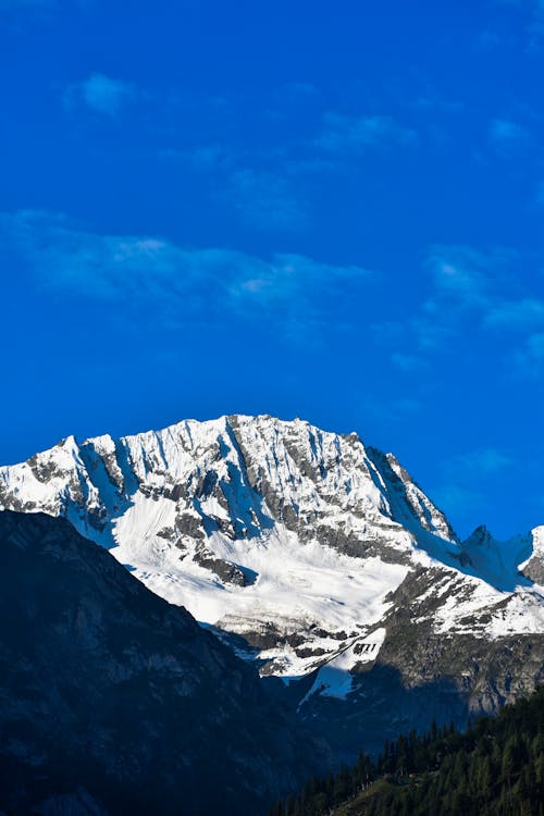 Kostnadsfri bild av berg, bergstopp, blå himmel