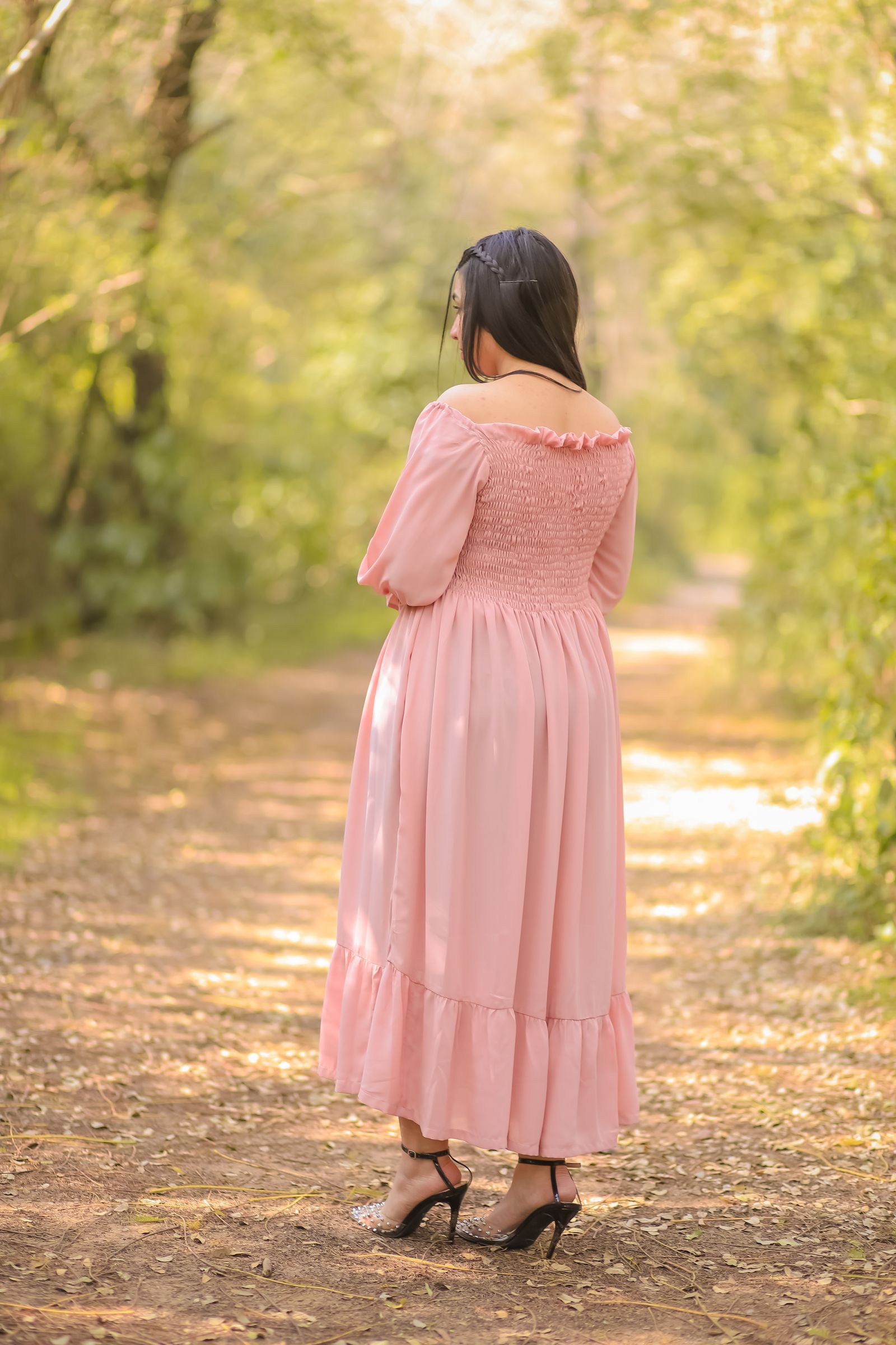 Young Woman in a Pink Dress Posing Outdoor · Free Stock Photo