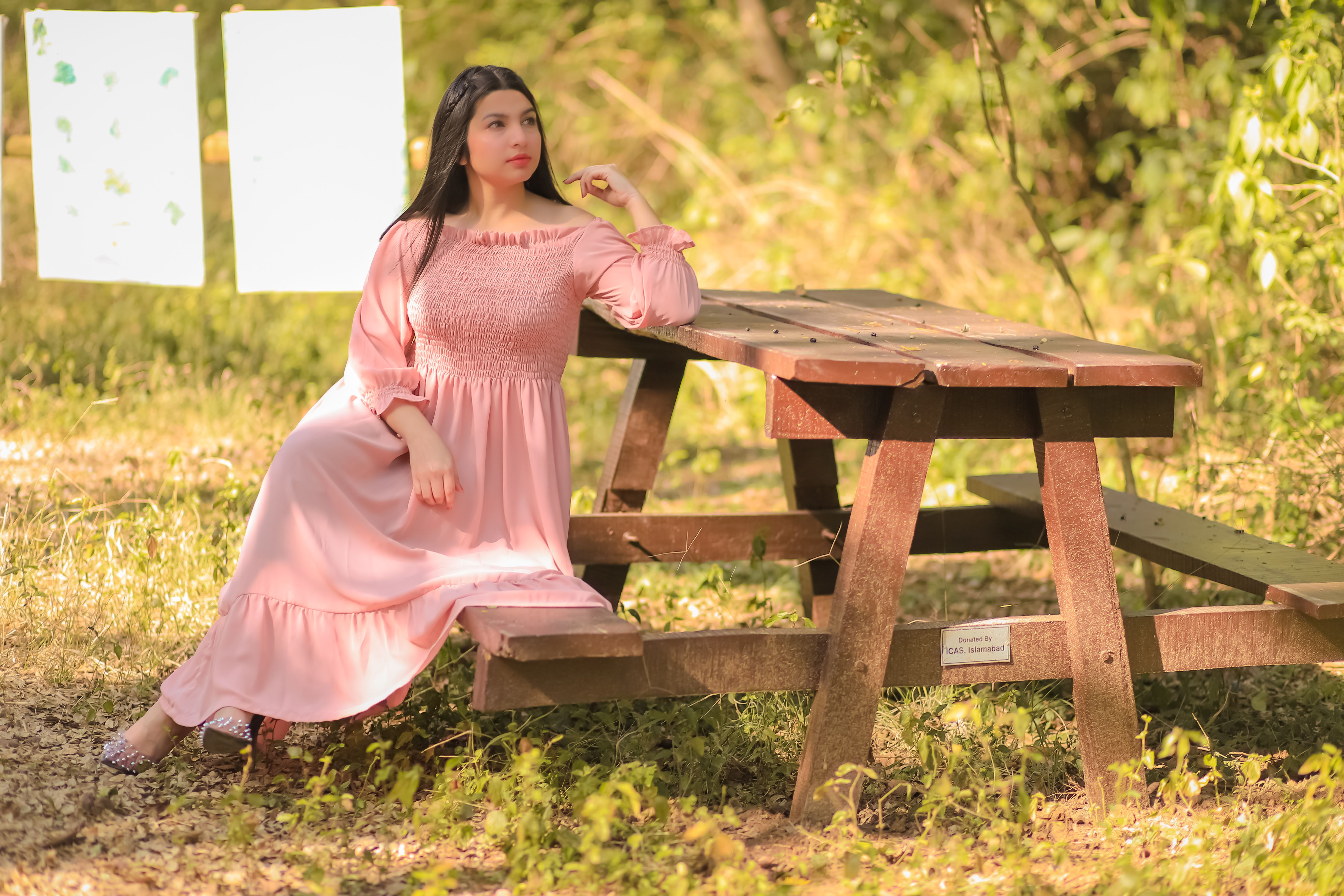 Sitting Woman in Pink Dress · Free Stock Photo