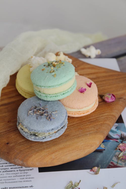 Colored French Macaroons on a Cutting Board