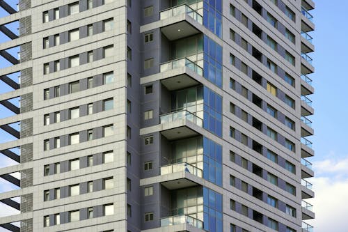 Balconies in modern apartment buildings in new neighborhood