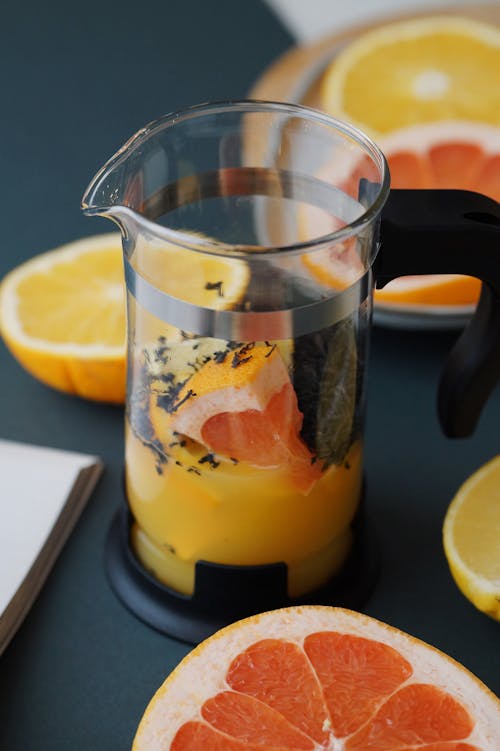 無料 オレンジ, ガラス, グレープフルーツの無料の写真素材 写真素材