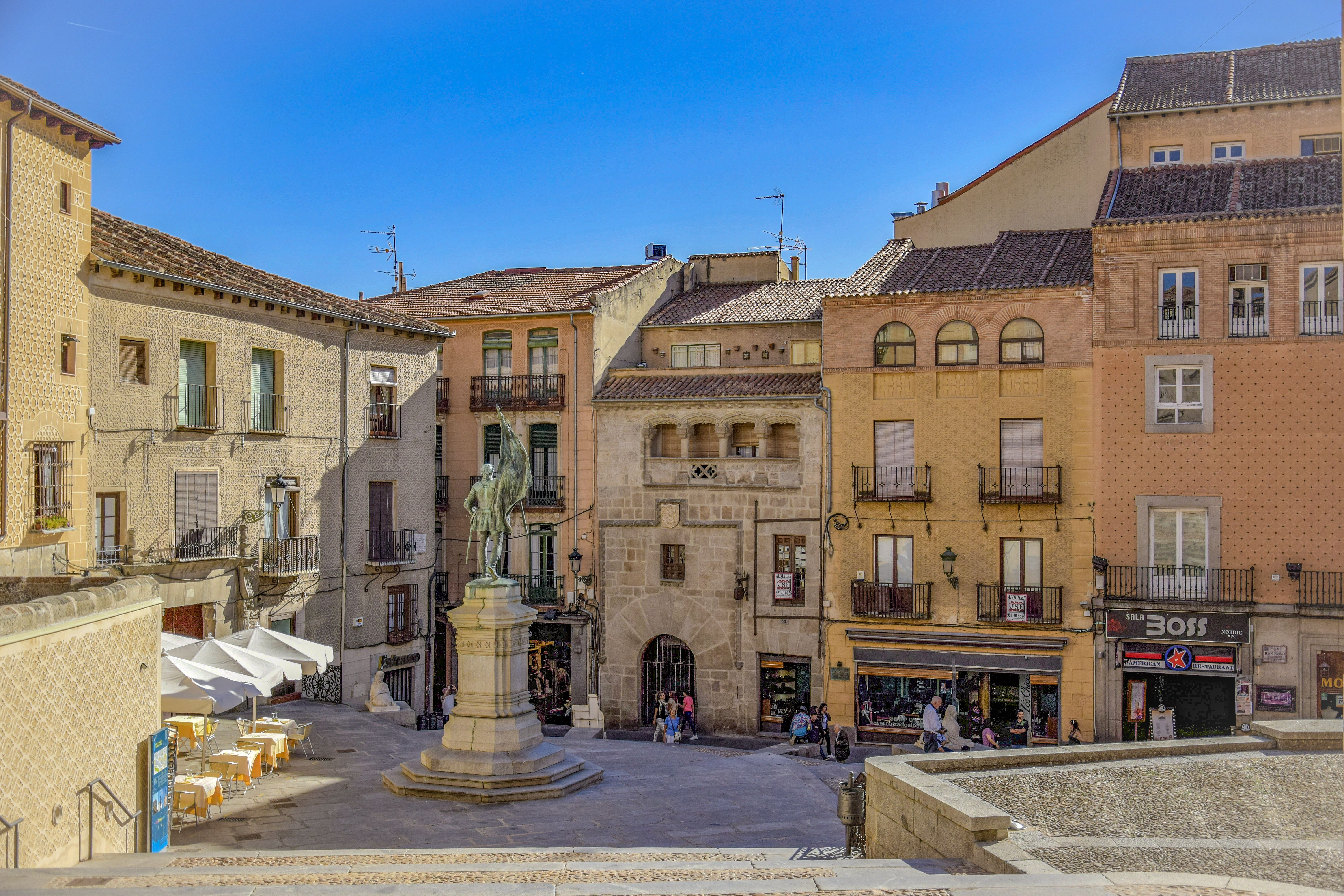 The two-tiered Roman aqueduct arches crossing Plaza del Azoguejo