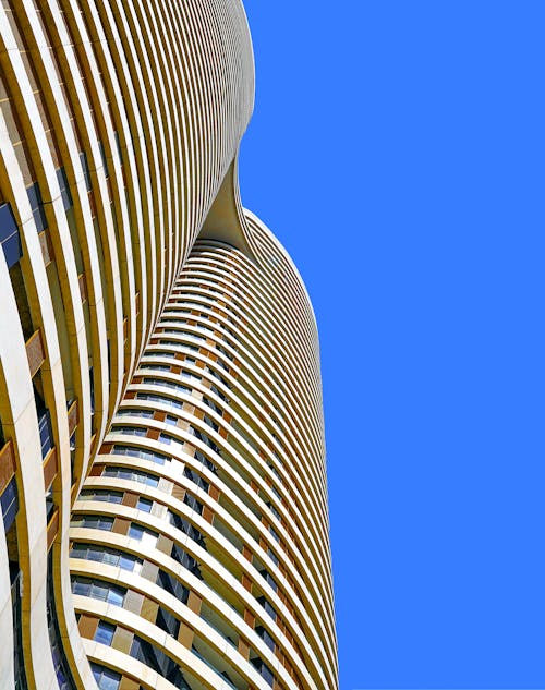 Bottom view of residential building of blue sky