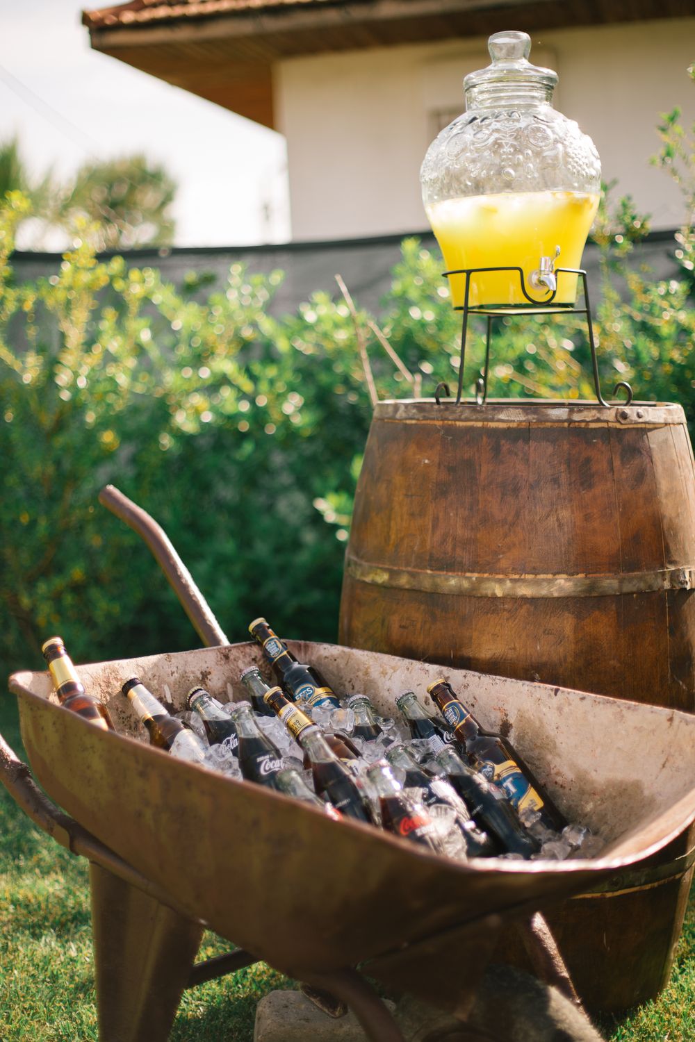 Bottles in Wheelbarrow · Free Stock Photo