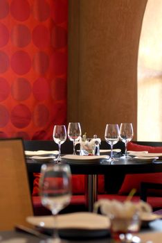 A stylish restaurant table setting in Marrakech with elegant glassware and tableware.