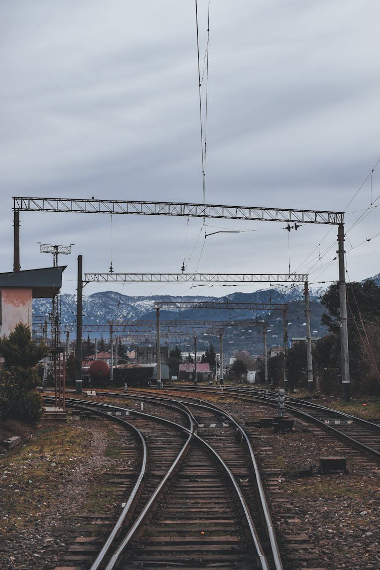 Electricity Lines Above Railroad Tracks