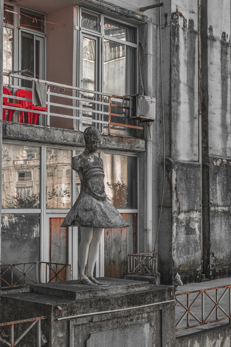 Stone Statue Outdoor On Residential Building