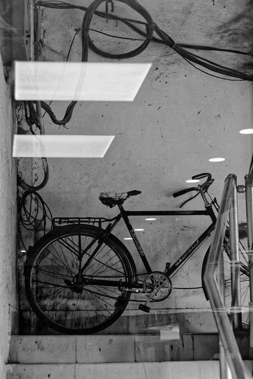 Free A classic bicycle captured indoors through a monochrome perspective in Rangpur, Bangladesh. Stock Photo