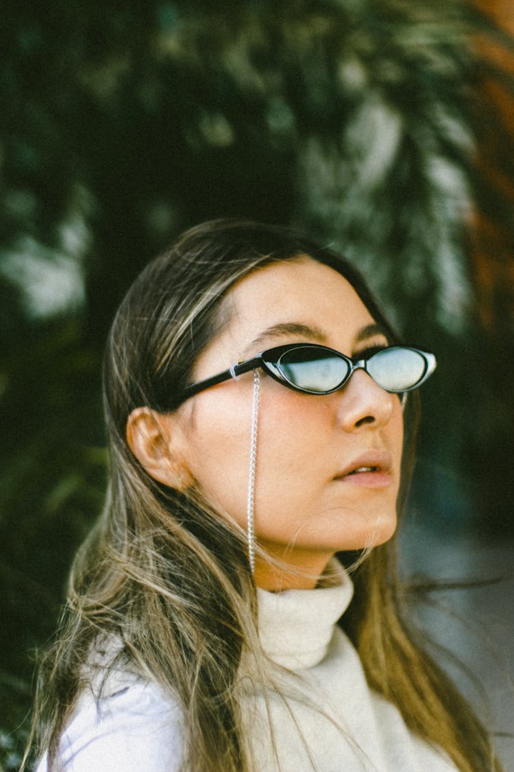 Photo Of A Young Blonde Girl In Sunglasses