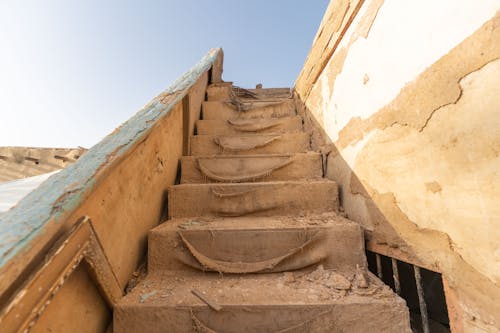 Decay Stairs in Sandstone Building