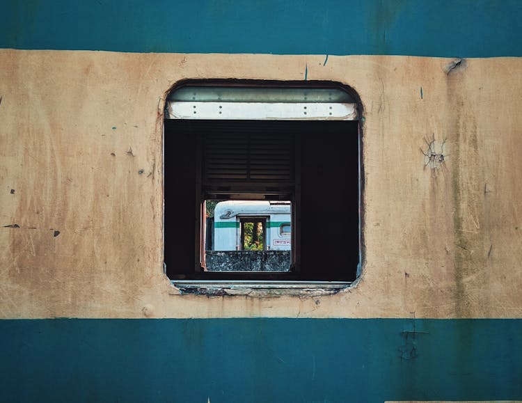 Destroyed Window Of Carriage Train