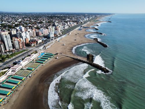 Free Stunning aerial view of Mar del Plata's coastline with beach and cityscape, Buenos Aires Province. Stock Photo