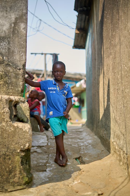 Portrait of Boy in Village