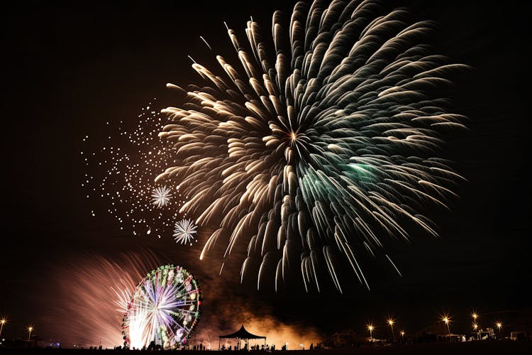 Fireworks Display Over Ferris Wheel