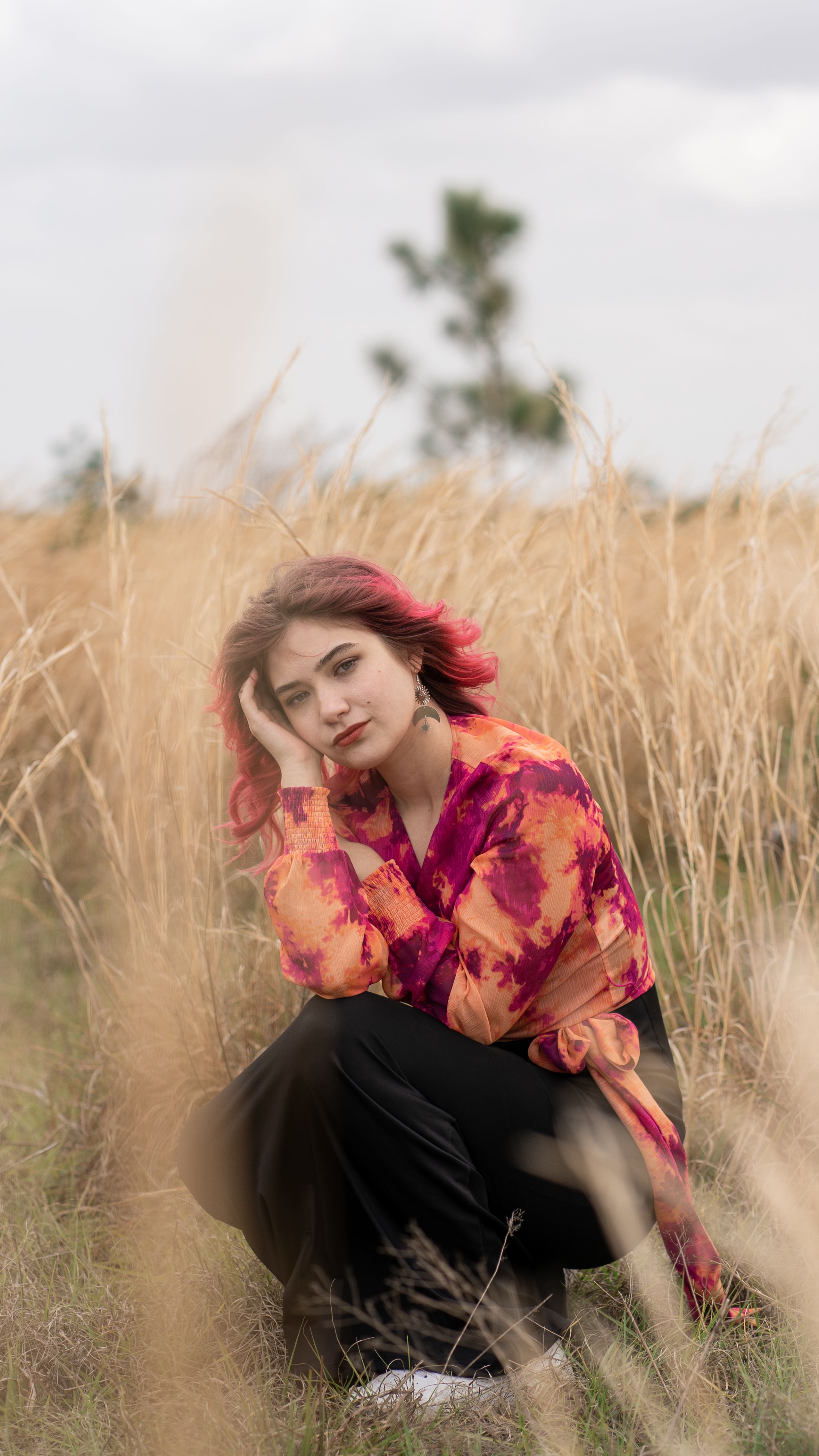 Portrait of a Woman with Red Hair in a Field · Free Stock Photo