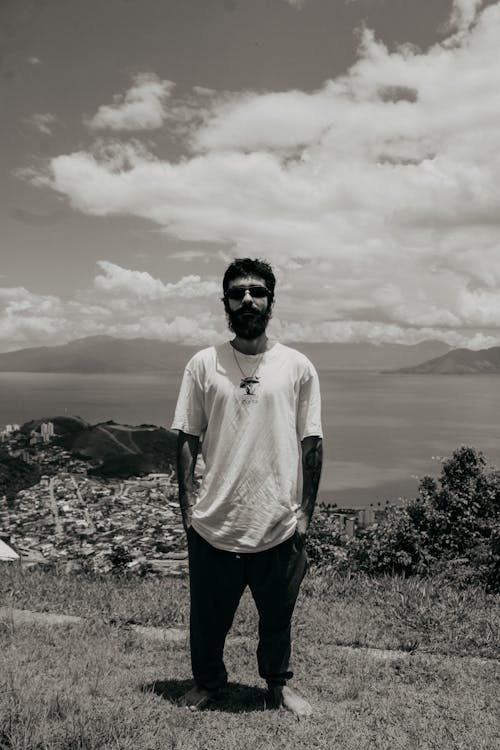 Man in T-shirt Posing in Sunglasses