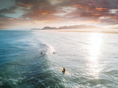 View of Three People Surfing