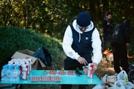 Man Standing Near Table