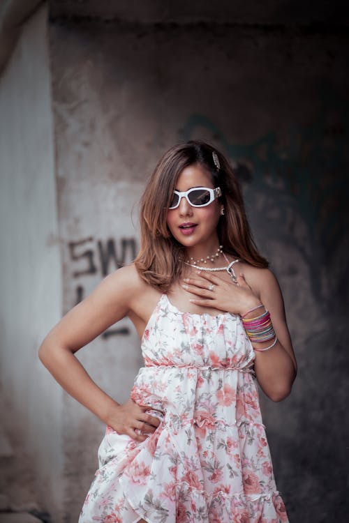 Model in Dress and Sunglasses