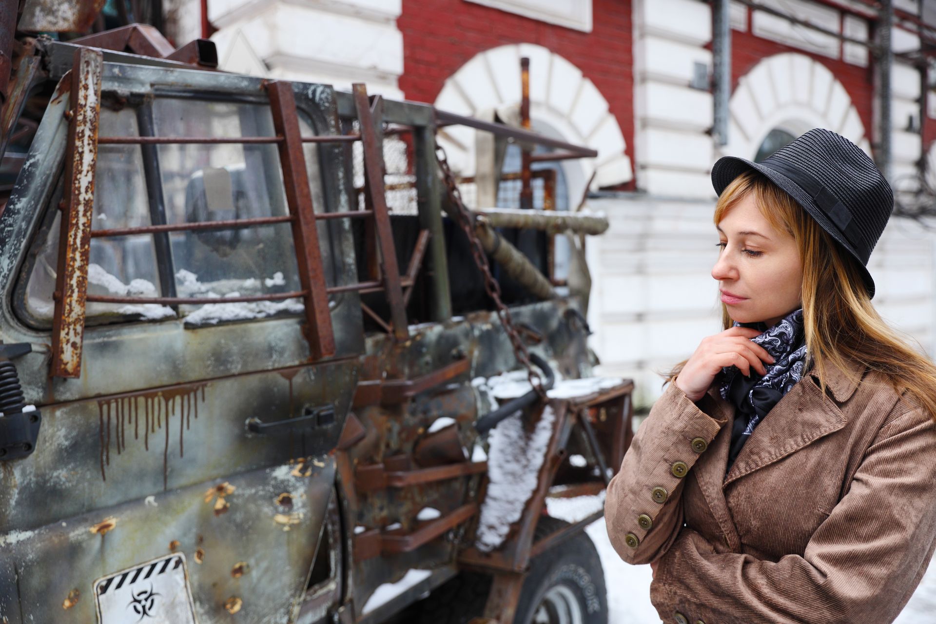 Woman Looking at Vehicke Wreck