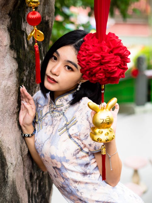 Woman Posing with Traditional Decorations