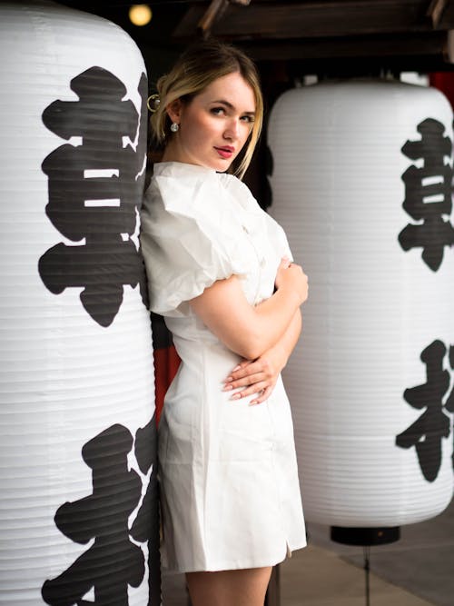 Woman Posing in White Clothes